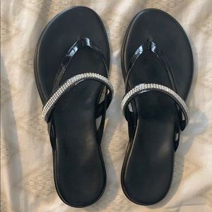 Black sparkle flip flops